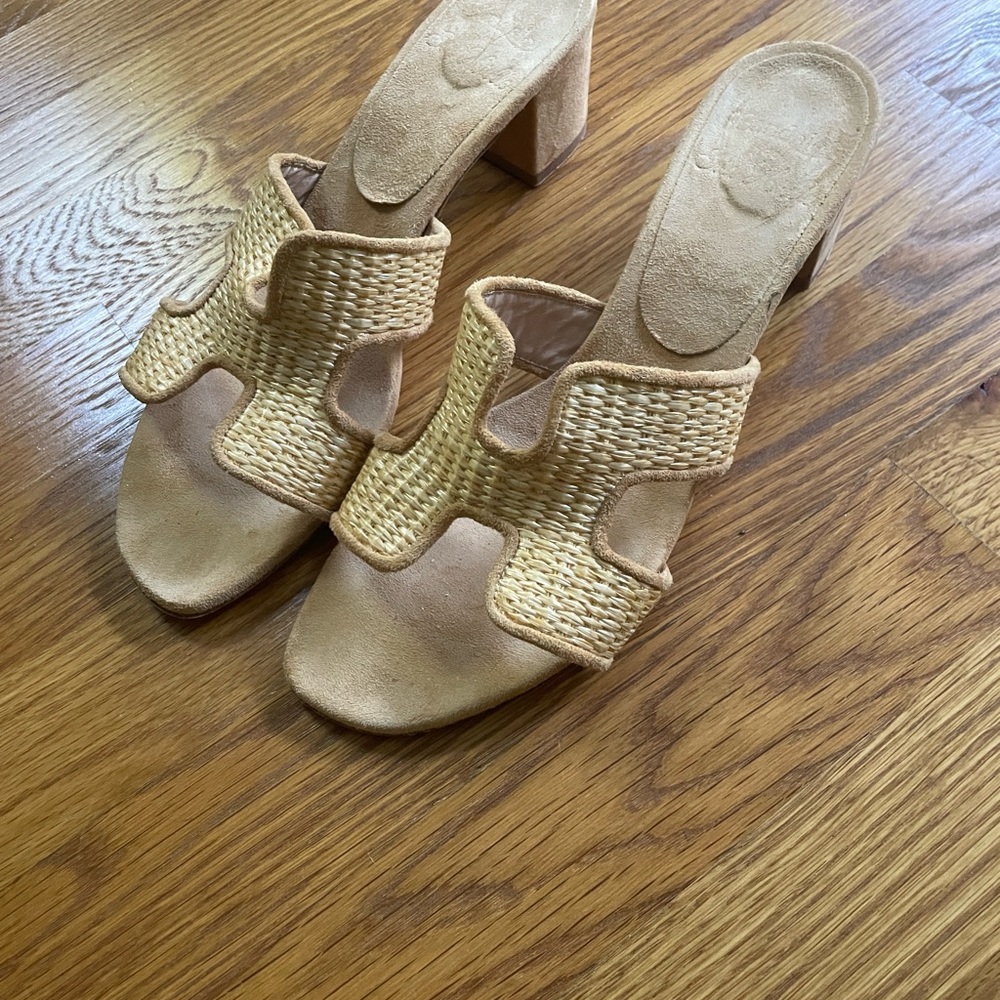 Sandal with woven material.